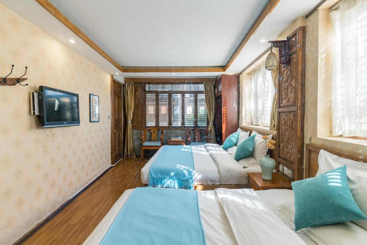 He Mu Ju Inn Zhongyi Branch Ліцзян Екстер'єр фото